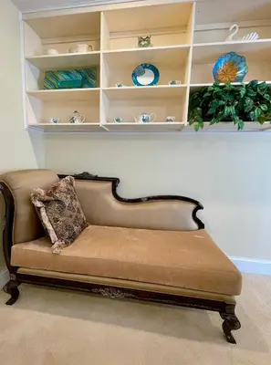 a couch sitting in a room with shelves at Spacious Guest Suite 5 Minutes to Princeton University with Free Parking in Princeton