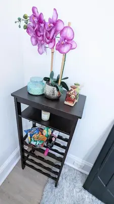 a black table with purple flowers on top of it at Luxury 2bedrooms 1bath home near philly museum Temple and center city in Philadelphia