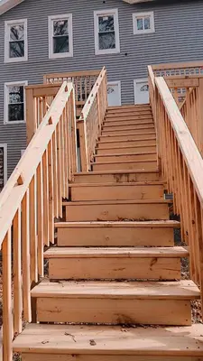 a wooden staircase in front of a house at Labelle in Wilkes-Barre
