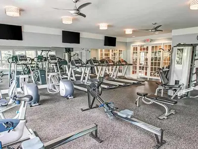 a gym with a lot of exercise equipment in it at Landing Spectacular 2BD Clubhouse Pool in King of Prussia