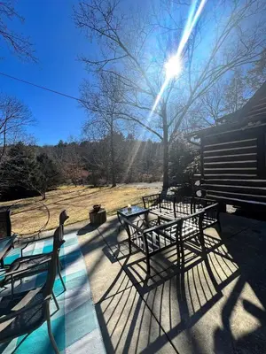 a group of picnic tables sitting on a patio at Stony Creek Lodge in East Stroudsburg