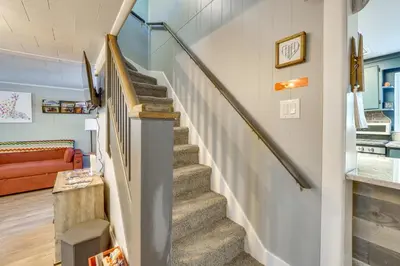 a winding staircase in a home with a living room at Little Woodland Home Hidden Gem By Dtwn Bethlehem in Bethlehem
