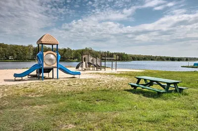 a playground with a slide and a picnic table at Less Than 1 Mi to Lake Family Home in Albrightsville! in Albrightsville