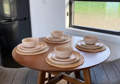 a table with three cups and saucers on it at Tioga Ridge Lookout I Near Tioga-Hammond Lake