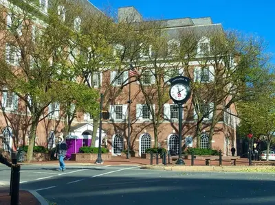 a building with a clock on the front of it at THE WINTER HOUSE - HISTORIC DOWNTOWN LANCASTER in Lancaster