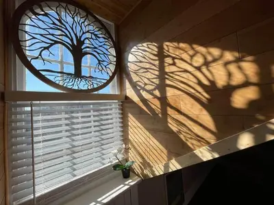 a window in a room with a tree reflection in it at THE LEMON TREE - DOWNTOWN HISTORIC LANCASTER in Lancaster