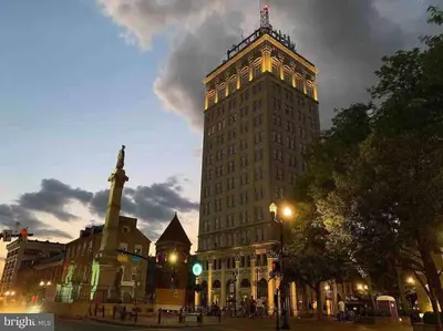 a tall building with a tower on top of it at THE LEMON TREE - DOWNTOWN HISTORIC LANCASTER in Lancaster