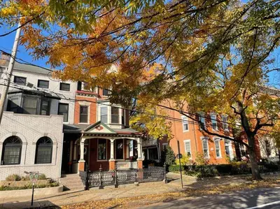 a group of houses on a city street at BLETCHER GARDEN LOFT - LANCASTER HISTORIC DISTRICT in Lancaster