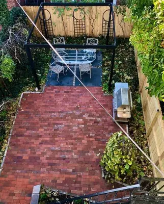 an overhead view of a garden with a brick walkway at BLETCHER GARDEN LOFT - LANCASTER HISTORIC DISTRICT in Lancaster