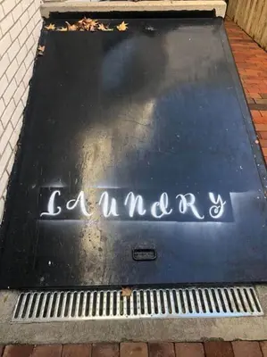 a sign that says a market on a sidewalk at BLETCHER GARDEN LOFT - LANCASTER HISTORIC DISTRICT in Lancaster