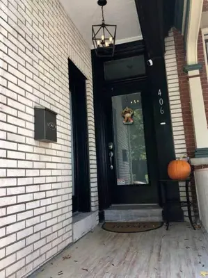 a front door of a house with a pumpkin on it at THE ROYER HOUSE - LANCASTER'S HISTORIC DISTRICT in Lancaster