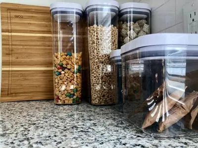 a bunch of glass jars filled with different types of nuts at THE ROYER HOUSE - LANCASTER'S HISTORIC DISTRICT in Lancaster