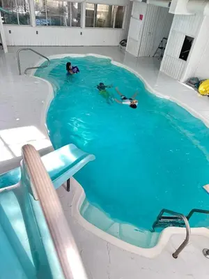 a person swimming in a swimming pool at Honesdale in Honesdale