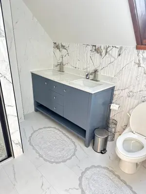 a bathroom with a sink and a toilet at Honesdale in Honesdale