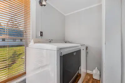 a washer and dryer in a room with a window at Stay on State in Duncannon