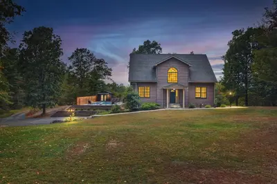 a house with a green lawn in front of it at Happy Trails House in Liverpool