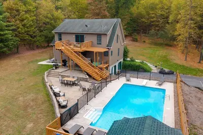 an aerial view of a house with a swimming pool at Happy Trails House in Liverpool