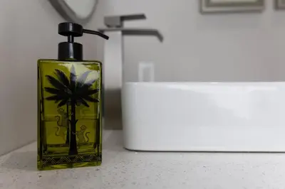 a yellow soap bottle sitting on a counter at An Locha B&B