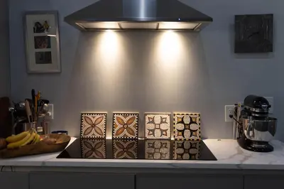 a kitchen counter with four boxes on a counter top at An Locha B&B