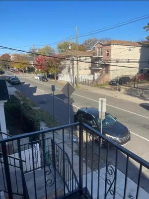 a car parked on the side of a street at Peace Haven Stay in Newark
