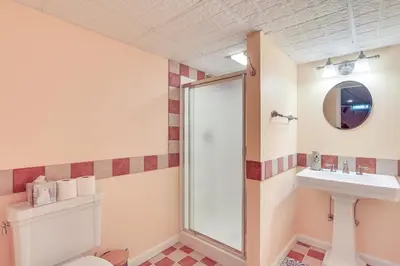 a bathroom with a shower and a sink at 5 Mi to Princeton Family Home with Deck and Yard! in Dutch Neck