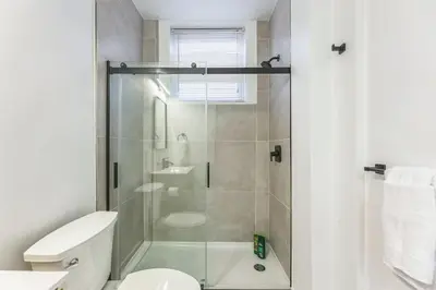 a bathroom with a shower and a toilet at New Studio in Center City that Sleeps 4 with Fast Wifi in Philadelphia