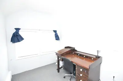 an office with a desk and a window at Cozy Beds with Parking, Laundry - Near RU, RWJ, NJ Transit in Highland Park