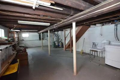 a large room with a table and chairs in it at Cozy Beds with Parking, Laundry - Near RU, RWJ, NJ Transit in Highland Park