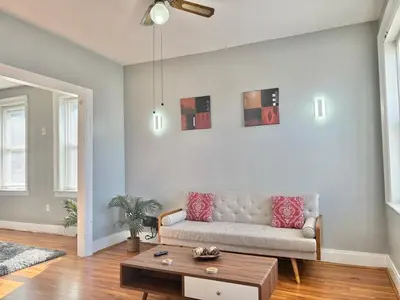 a living room with a couch and a coffee table at FREE Parking near NYC Washer and Dryer in North Bergen