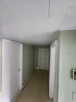 an empty room with green walls and a ceiling at Private Room - Shared Bathroom in Perth Amboy