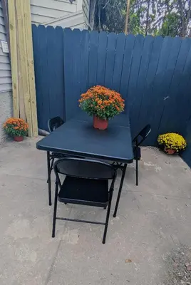 a blue table with a potted plant on it at 3bedroom 2 bath minutes away from Temple, Philly museum, Philly zoo , center city in Philadelphia