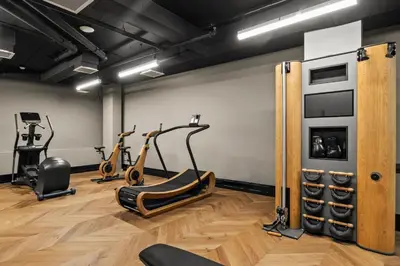 a gym with cardio machines and exercise bikes at Freeman 501 by Rove Travel - Studio with Shared Amenities in New York
