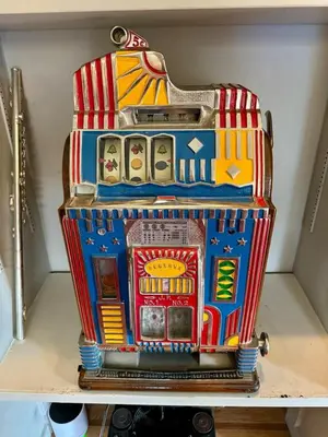 a cake shaped like a slot machine on a shelf at Private Luxurious Canal Estate in Princeton