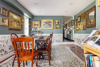 a dining room with a table and chairs at Unique Luxury Central Historic Landmark Home in Lambertville