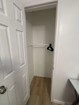 an empty room with a door and a closet at Entire Cozy Apartment Fully Renovated Modern Style in North Brunswick
