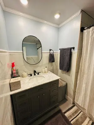 a bathroom with a sink and a mirror at The Princeton Three Cozy 3BR Retreat, BBQ Patio - Shared Home in Trenton