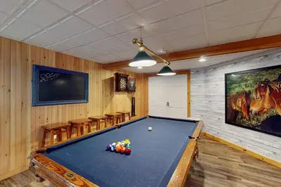 a room with a pool table in a room at Vista at Camelback Mountain in Tannersville