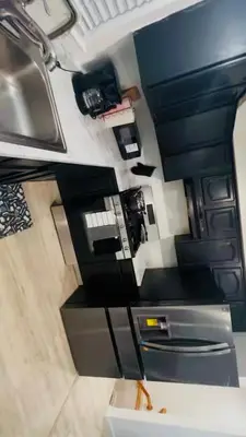 an overhead view of a kitchen in a train at Cozy Home 3BR-2Bath near EWR NYC DreamMall MetLife in Newark