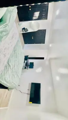 an overhead view of a room with a bed at Cozy Home 3BR-2Bath near EWR NYC DreamMall MetLife in Newark