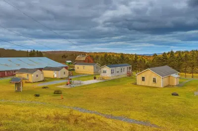 an aerial view of a farm with houses and trees at Relaxing Premium Suite Near Ski Resort in Pleasant Mount