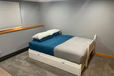 a bedroom with a bed in a room at Ski-InandSki-Out Camelback Mtn Retreat with Hot Tub in Tannersville