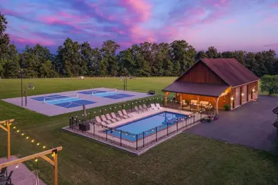 an overhead view of two swimming pools and a barn at Ridgetop Cabin in Elliottsburg