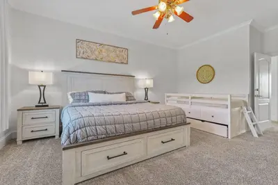 a bedroom with a bed and a ceiling fan at Willow Brook Mansion in Millerstown
