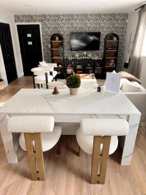 a white table and chairs in a living room at New York City views! in Kearny
