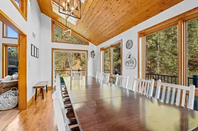 a dining room with a large table and chairs at Pine Hollow Lodge in Duncannon