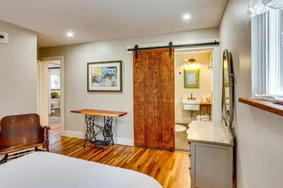 a bedroom with a bathroom with a shower and a sink at Serene Getaway with Trail Access in Chester Springs in Chester Springs
