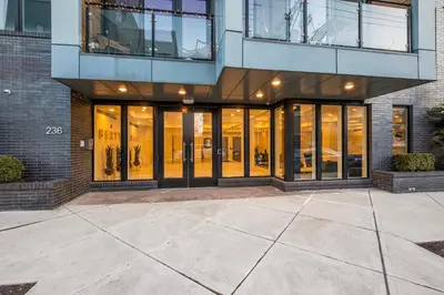 a building with large glass doors in a building at Luxury 1BR Getaway - Modern Stylish & Great Area in Philadelphia