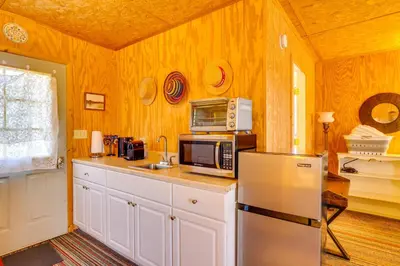 a kitchen with a refrigerator and a microwave at Hike, Ski and Golf Water-View Lake Winola Retreat! in Factoryville