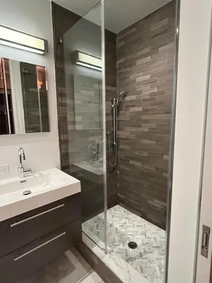 a bathroom with a shower and a sink at Residence Heritage Terrace Dreaming in New York