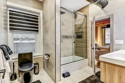a bathroom with a shower and a sink at Designer 5Bed - 4Bath Home in Old City A Plus Location in Philadelphia